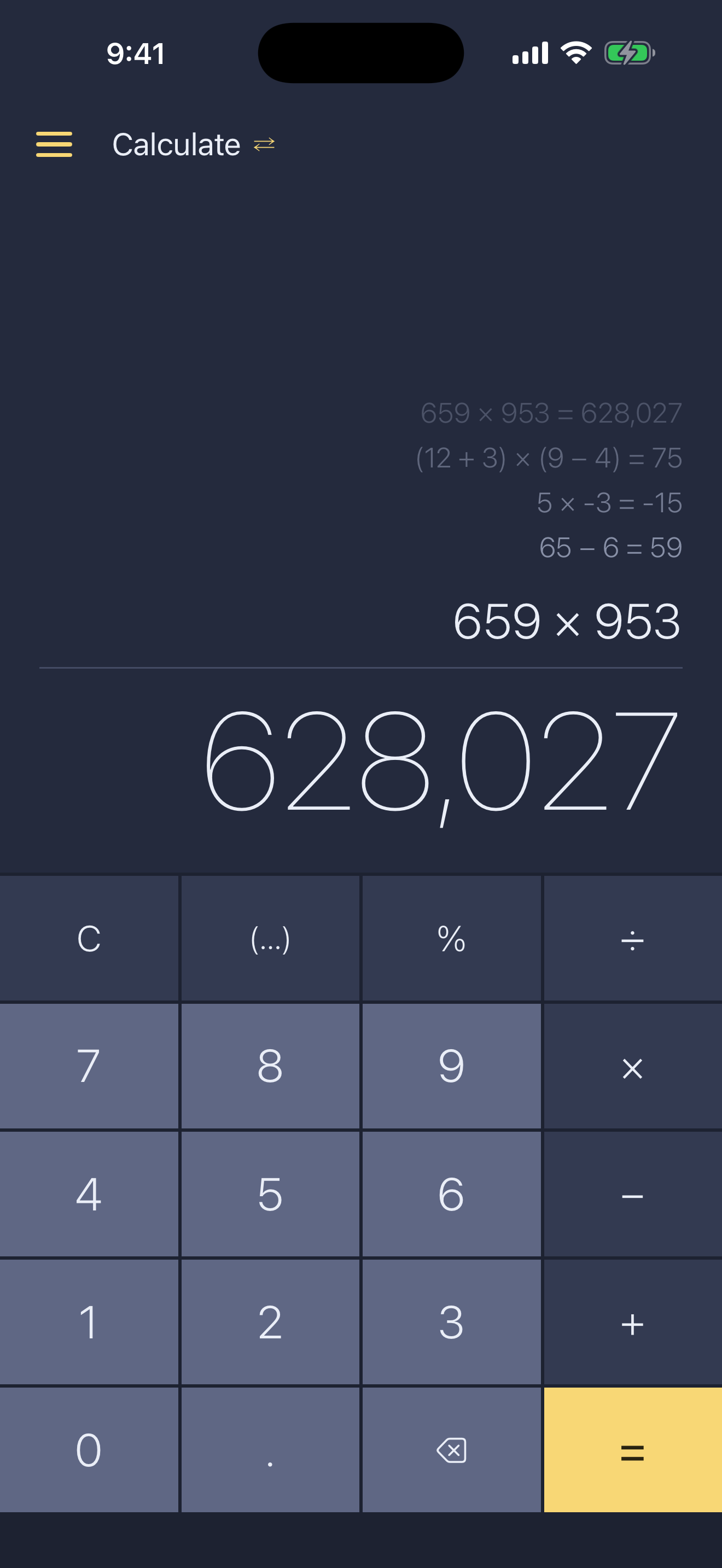 The history tape above the display, with 659 × 953 = 628,027 recalled as the current line